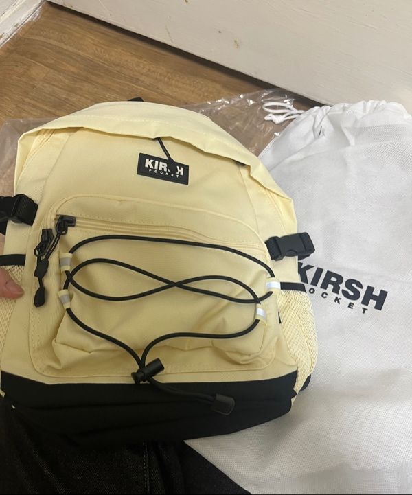 MUSINSA | KIRSH Pocket Technical Sling Bag [Ivory]
