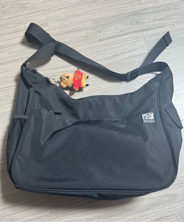 MUSINSA | MAHAGRID ROUND MESSENGER BAG(MG2DSUAB45A)