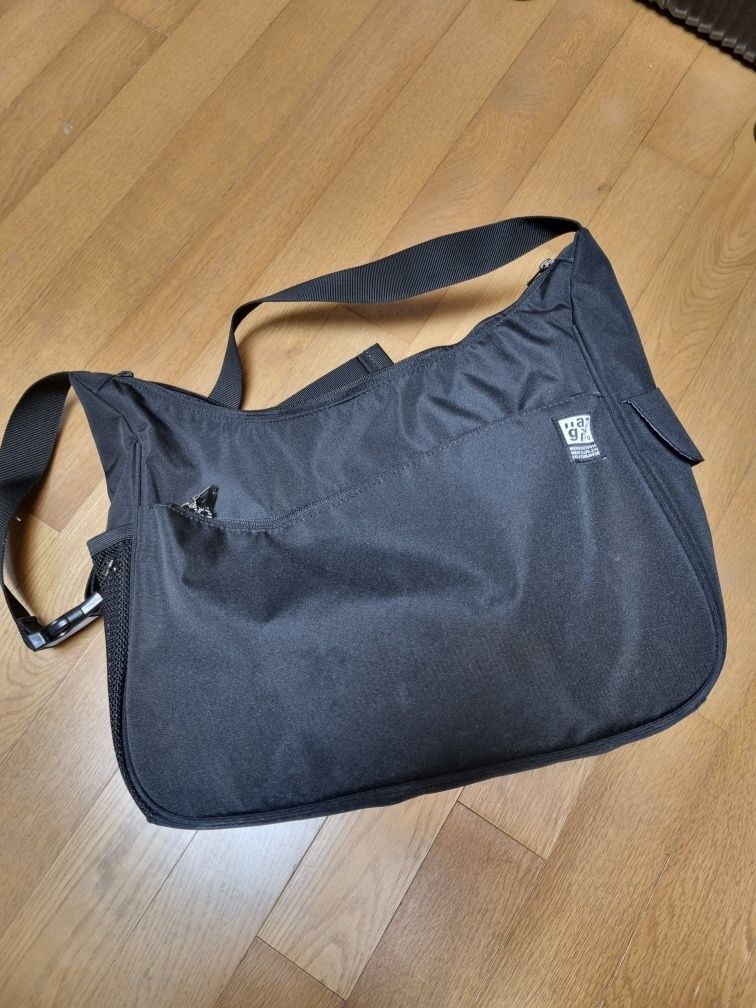 MUSINSA | MAHAGRID ROUND MESSENGER BAG(MG2DSUAB45A)