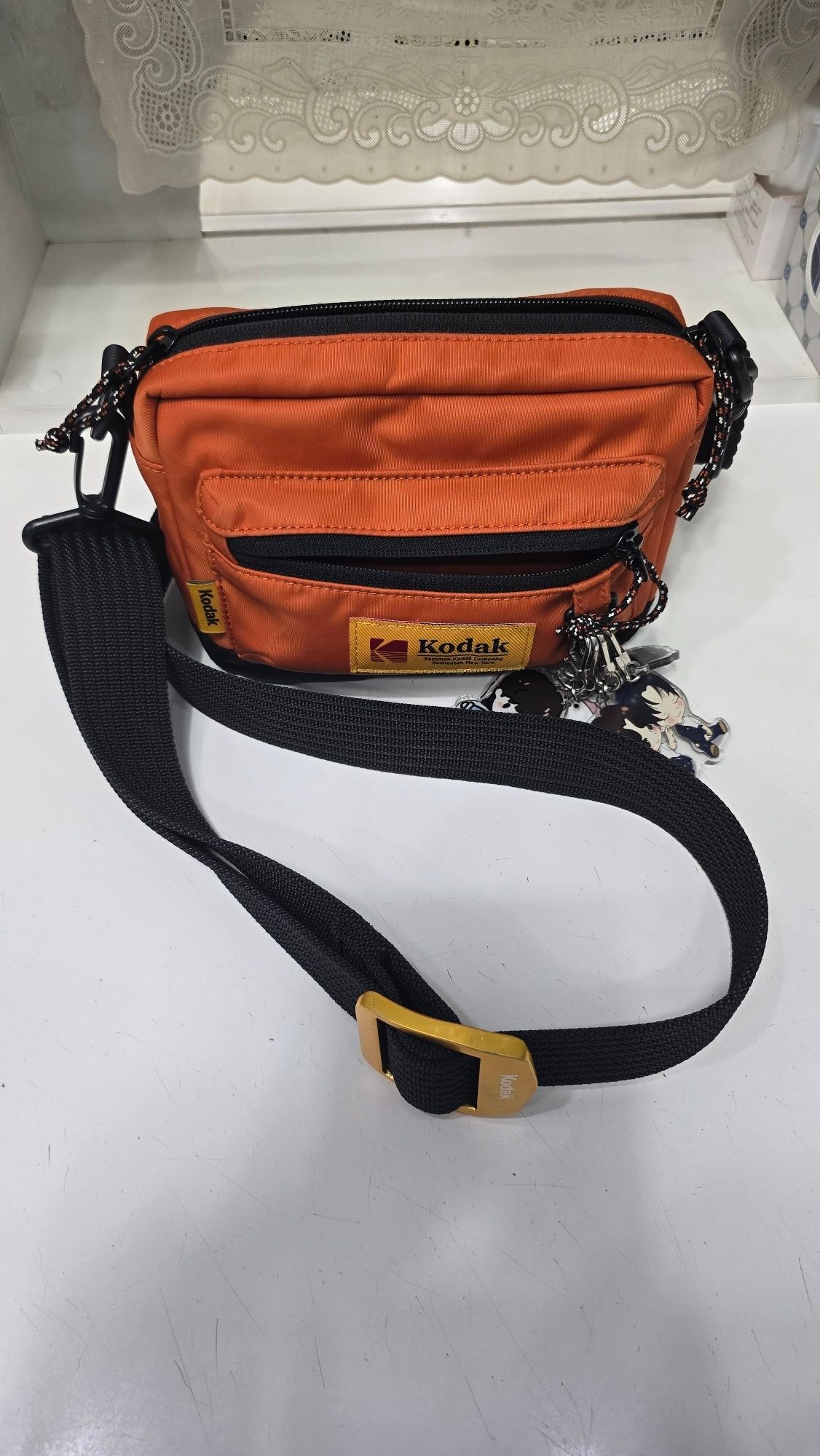 MUSINSA公式 | KODAK エッセンシャルスクエアミニクロスバッグ ORANGE