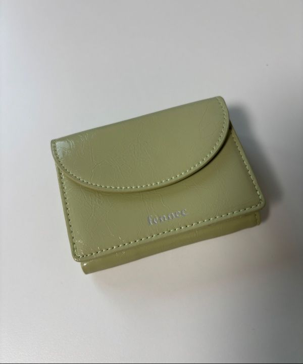MUSINSA | fennec CRINKLE HALFMOON MINI WALLET - SAGE MINT