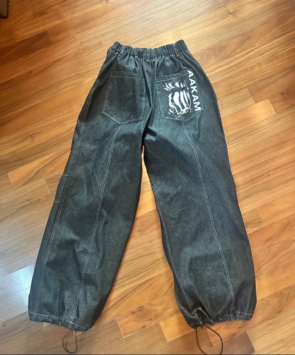 MUSINSA | AAKAM Knee Pin-tuck Printed Denim Pants (Black)