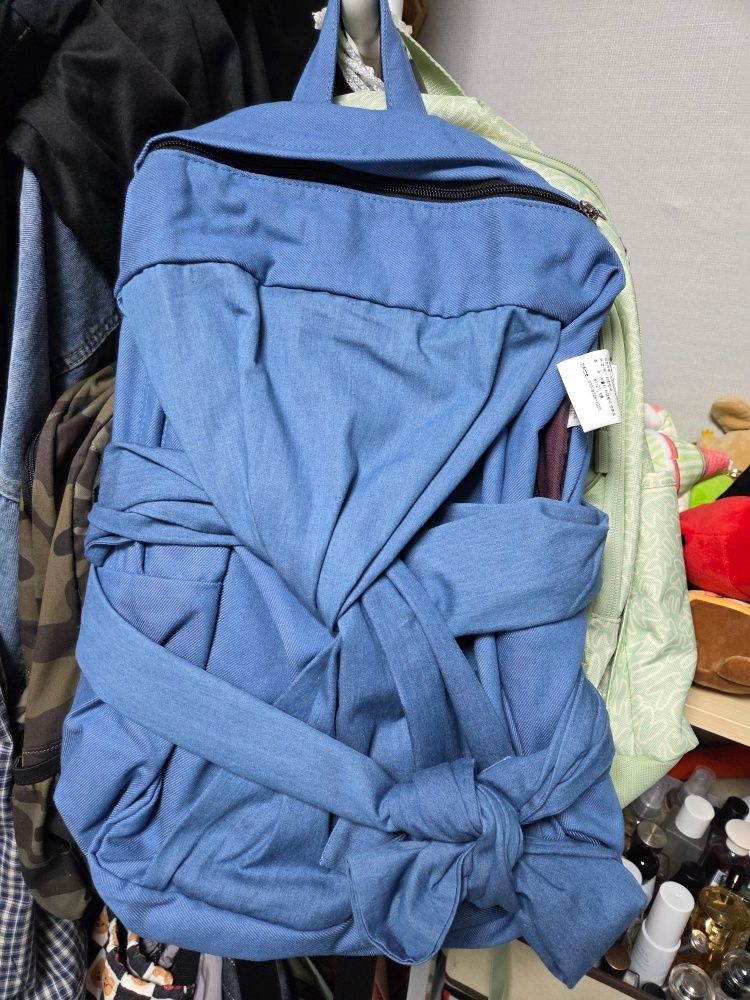 MUSINSA | IUGAMAKARAS Knotted Backpack (Denim-Sky Blue)