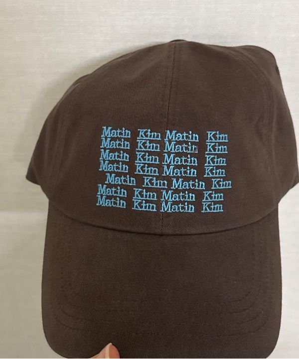 MUSINSA | MATIN KIM LETTERING BALL CAP IN BROWN
