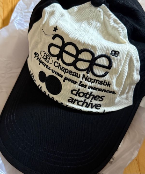 MUSINSA公式 | AEAE WEB LOGO TWO TONE BALL CAP - [BLACK/WHITE]