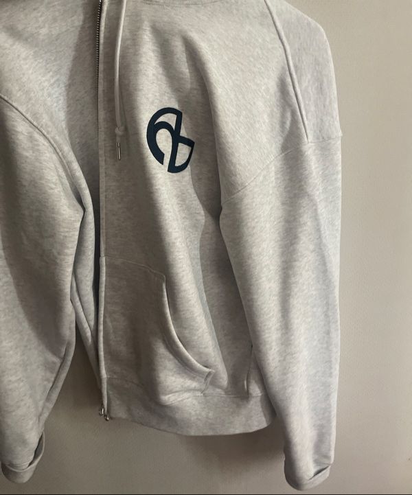 MUSINSA | NOMANUAL SYMBOL LOGO HOODED ZIP-UP - WHITE MELANGE