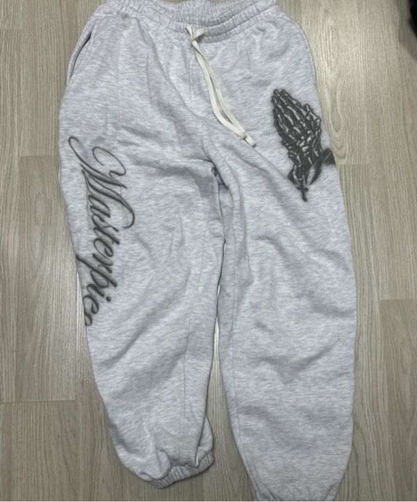 MUSINSA | SCULPTOR Praying Jogger Pants White Melange