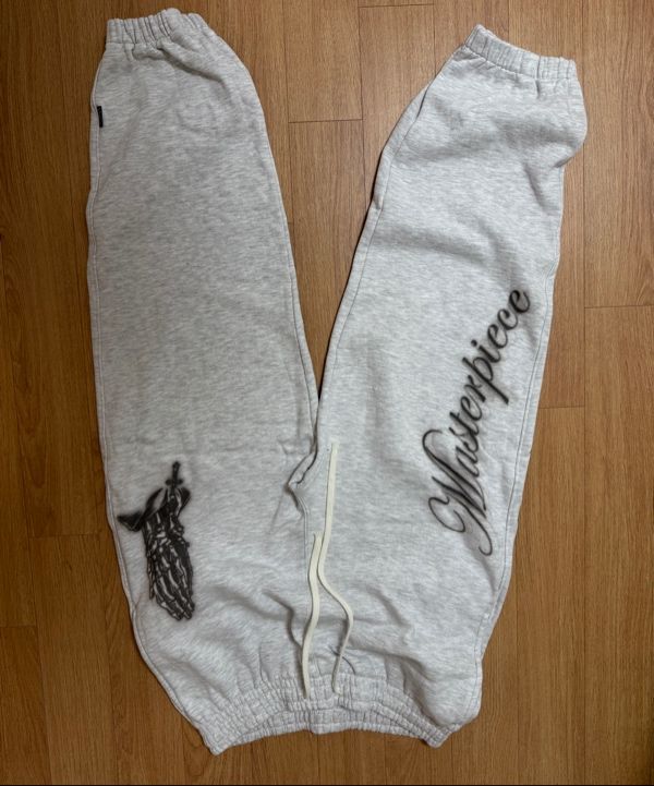 MUSINSA公式 | SCULPTOR Praying Jogger Pants White Melange