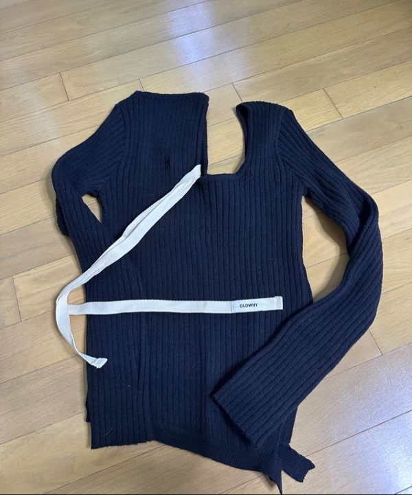 MUSINSA | GLOWNY ISA ASYMMETRICAL KNIT TOP (BLACK)