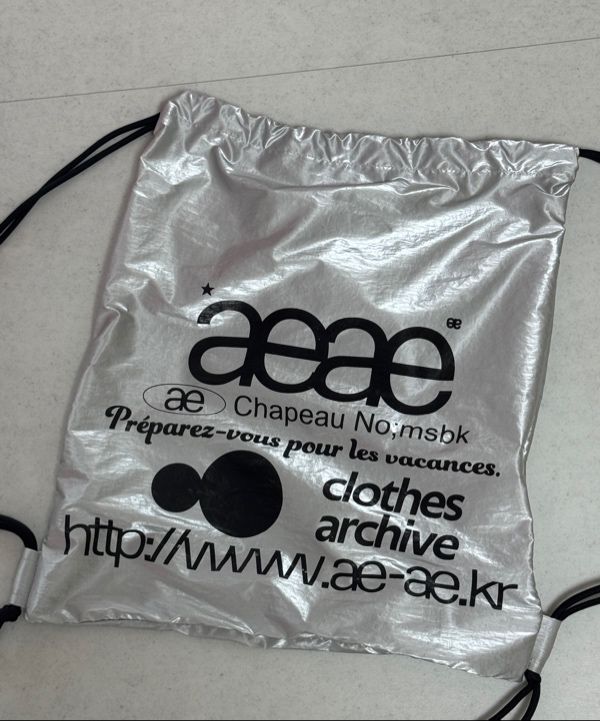MUSINSA公式 | AEAE Web Logo Gym Sack -[SILVER]