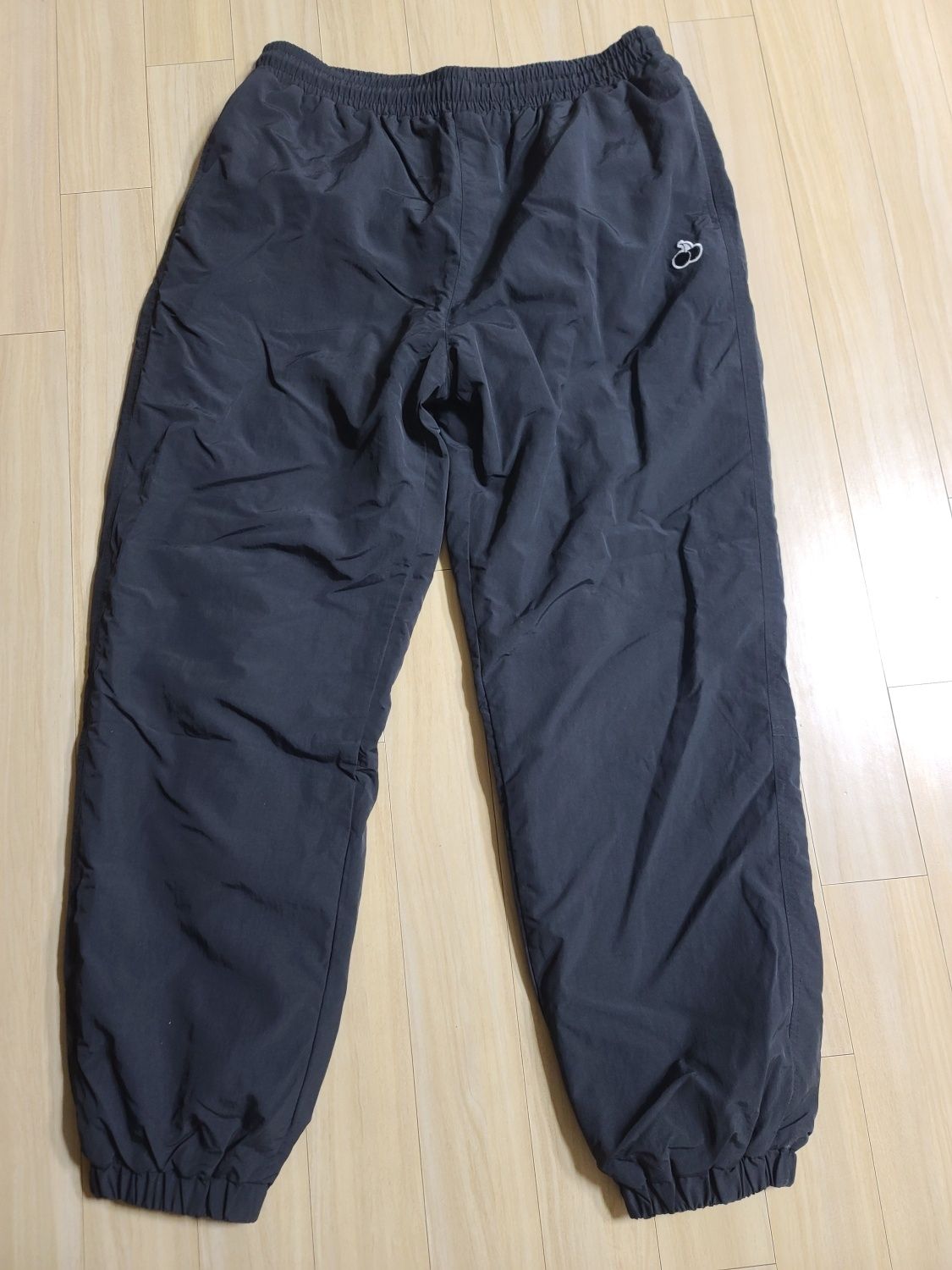 MUSINSA | KIRSH Uni Small Cherry Woven Jogger Pants [Black]