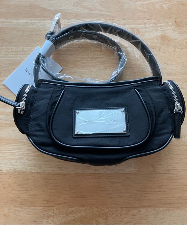 MUSINSA | MATIN KIM MADELEINE ROUND BAG IN BLACK