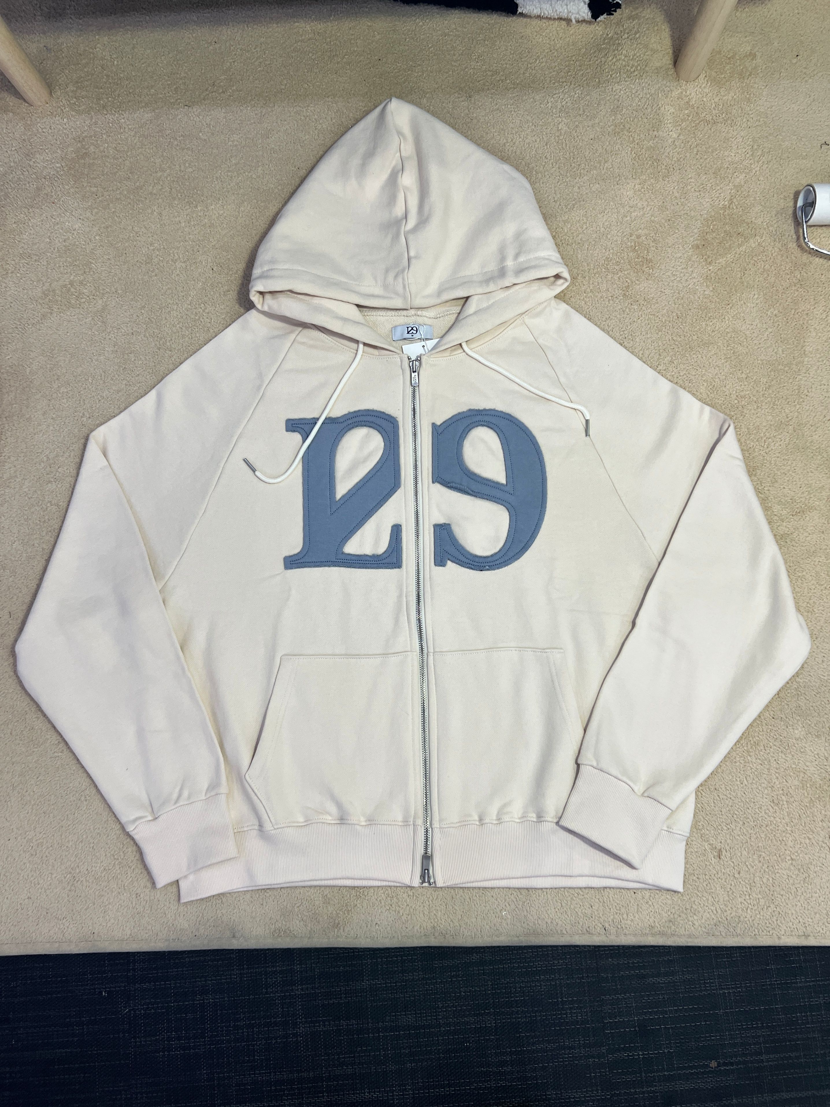 MUSINSA | ILLIGO 129 logo patch hooded zip-up cream