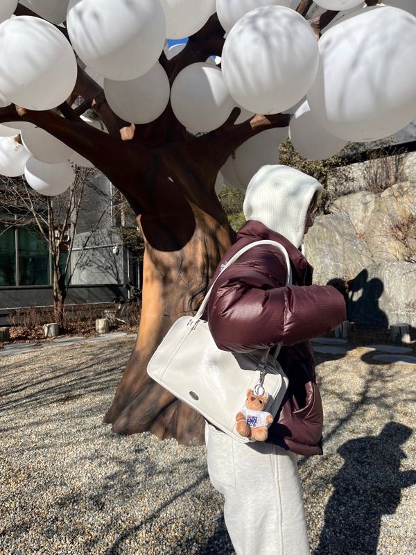 MUSINSA | DUMARO Journey shoulder bag / Ivory
