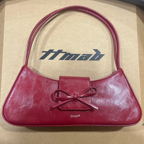 TTMAB ハンドバッグ　赤　リボン　MUSINSA MUSINSA | TTMAB Bow Small Baguette Bag - Fishnet Stockings Red