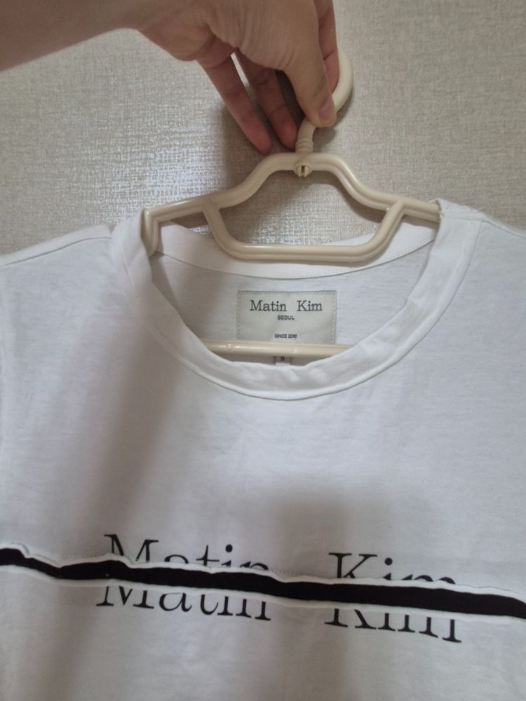 MUSINSA | MATIN KIM LOGO CUTTED CROP TOP IN WHITE