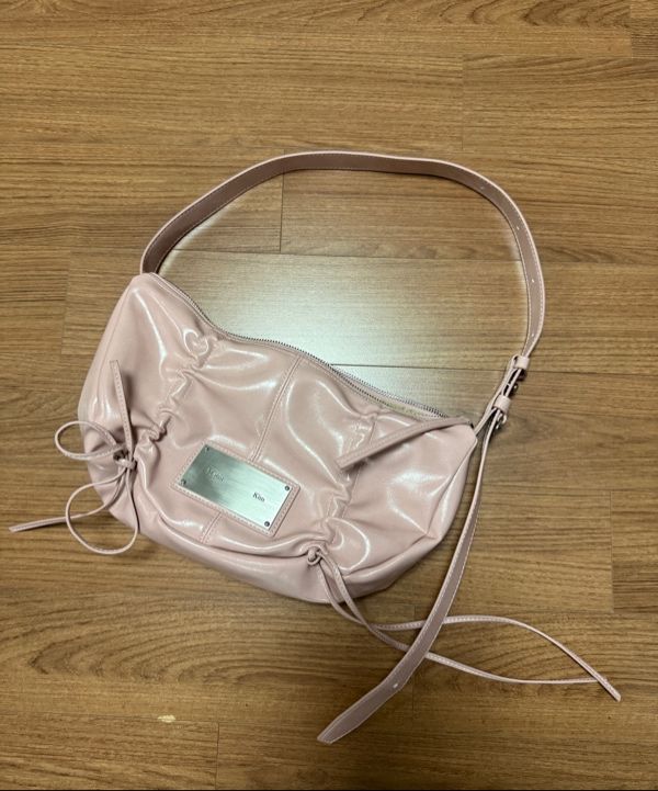 MUSINSA | MATIN KIM HALF SHIRRING RIBBON ROUND BAG IN PINK