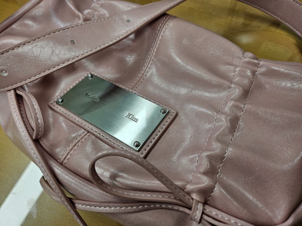 MUSINSA | MATIN KIM HALF SHIRRING RIBBON ROUND BAG IN PINK