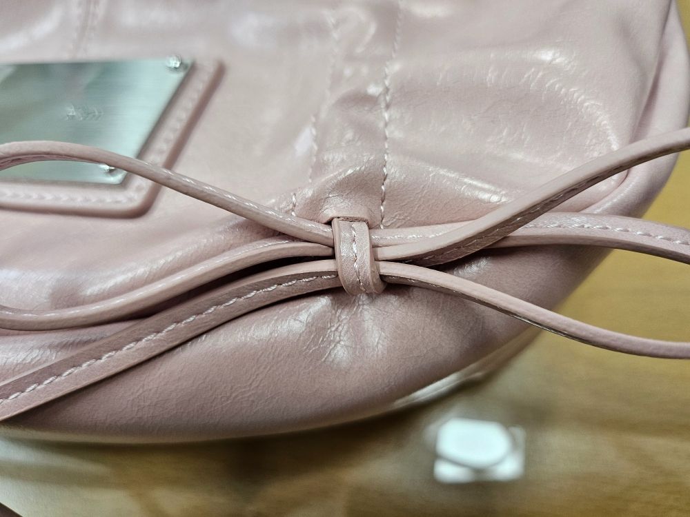 MUSINSA | MATIN KIM HALF SHIRRING RIBBON ROUND BAG IN PINK