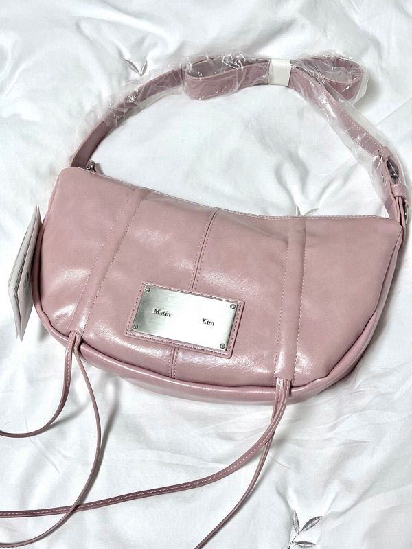 MUSINSA | MATIN KIM HALF SHIRRING RIBBON ROUND BAG IN PINK