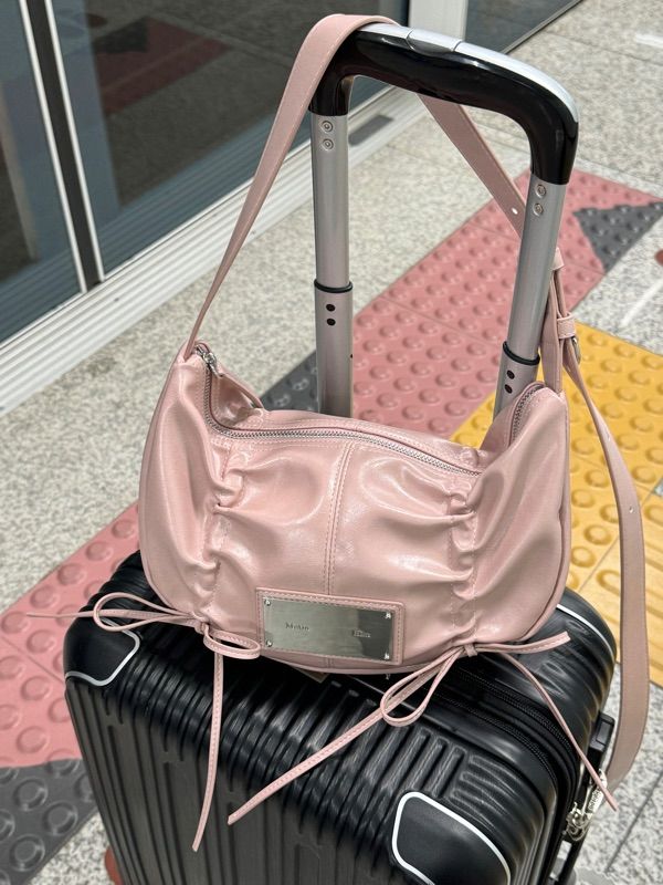 MUSINSA | MATIN KIM HALF SHIRRING RIBBON ROUND BAG IN PINK