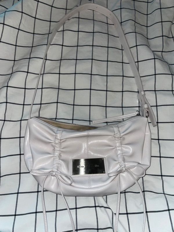 MUSINSA | MATIN KIM HALF SHIRRING RIBBON ROUND BAG IN IVORY