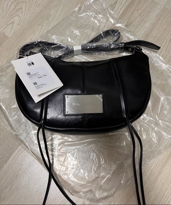 MUSINSA | MATIN KIM HALF SHIRRING RIBBON ROUND BAG (3 colors)