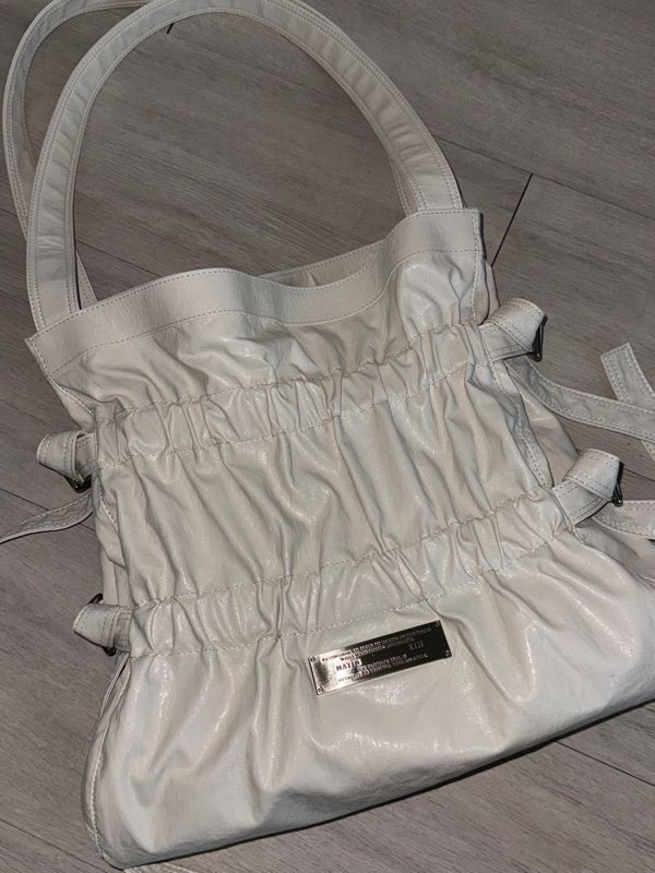 MUSINSA | MATIN KIM FAUX LEATHER SEASHELL BAG IN IVORY