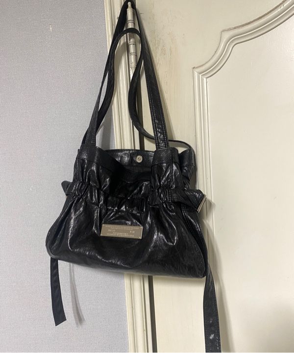 MUSINSA | MATIN KIM FAUX LEATHER SEASHELL MINI BAG IN BLACK