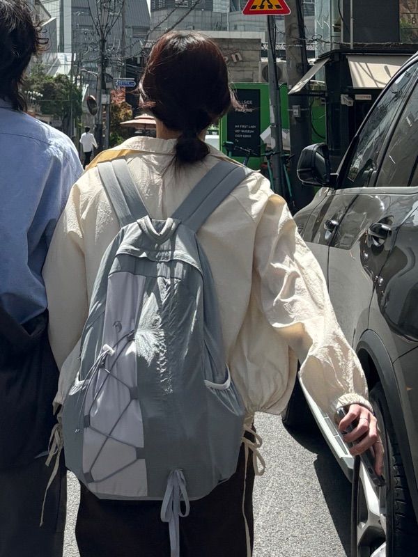 MUSINSA | WAI KEI Half string nylon backpack beige