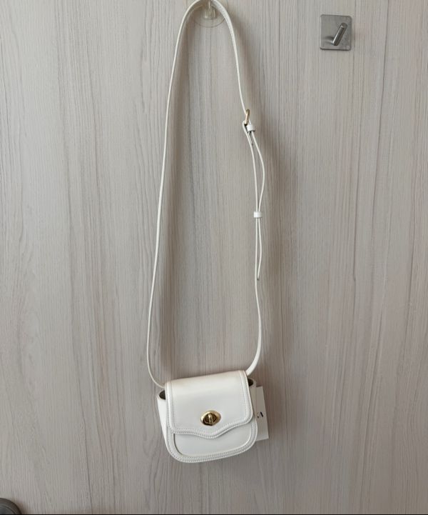 ★OSTKAKA★ Amuse Petit Cross 4colors MUSINSA | OSTKAKA Amuse Petit Cross Ivory