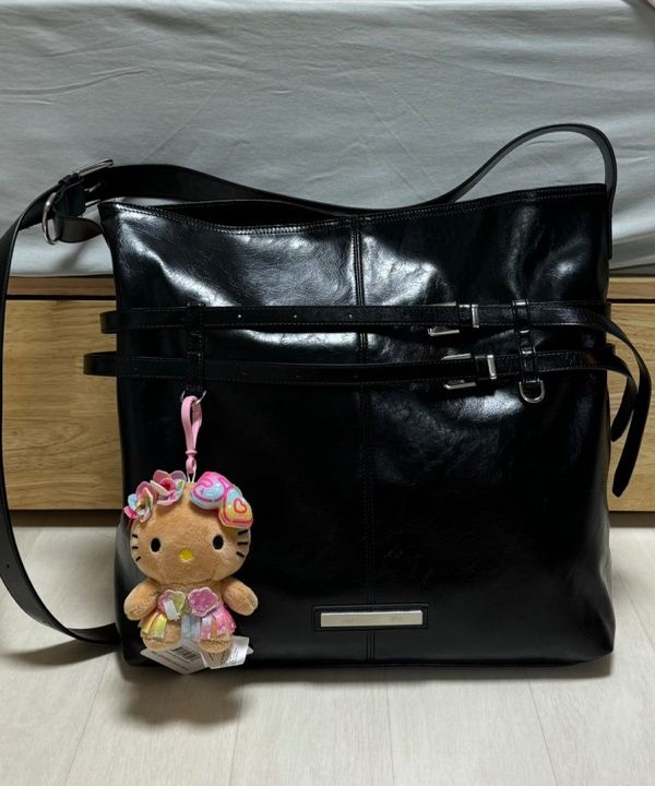 MUSINSA | MATIN KIM DOUBLE BELTED STRAP BIG BAG IN BLACK