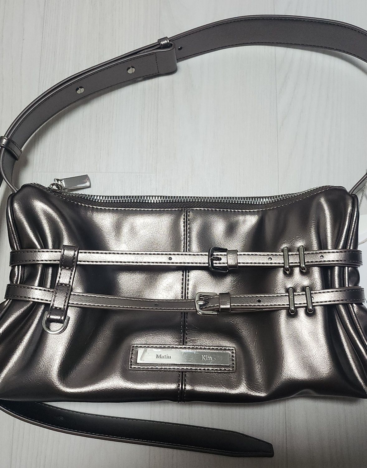 MUSINSA | MATIN KIM DOUBLE BELTED STRAP MINI BAG IN DARK BROWN