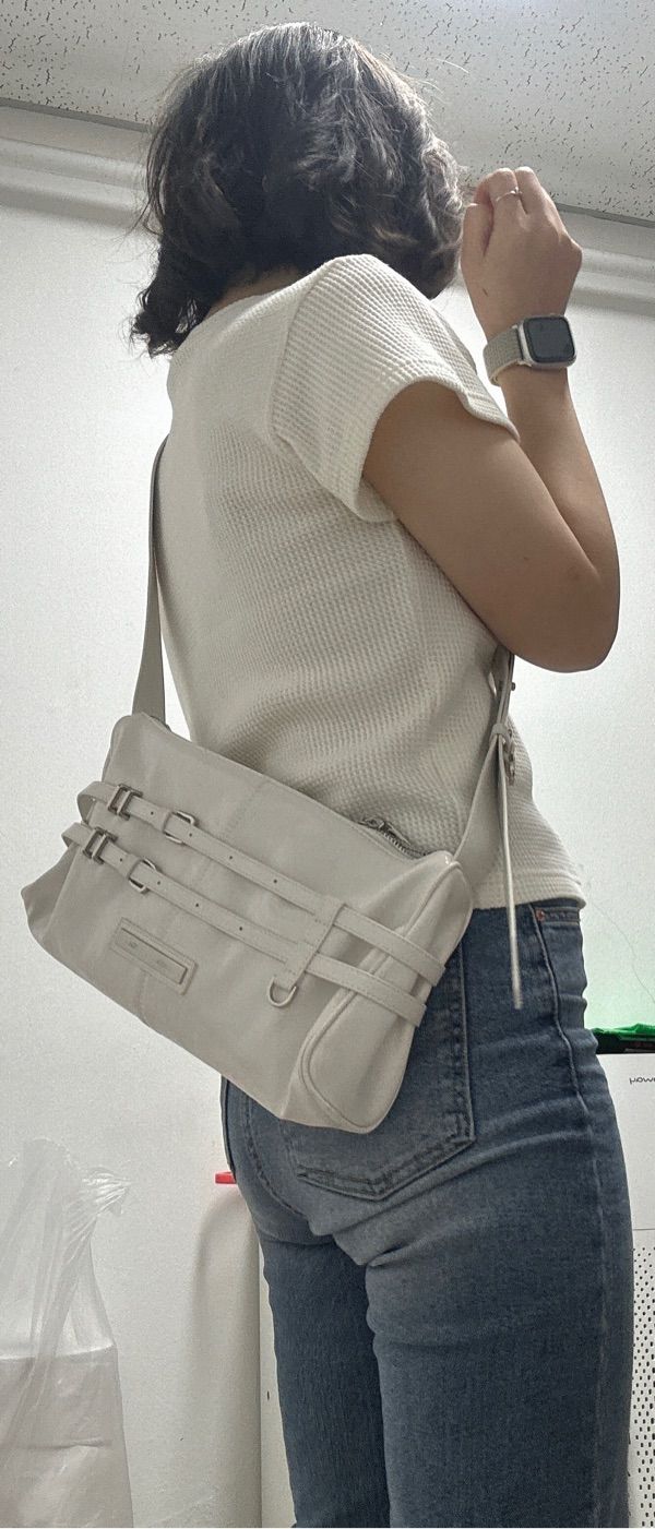 MUSINSA | MATIN KIM DOUBLE BELTED STRAP MINI BAG IN BLACK