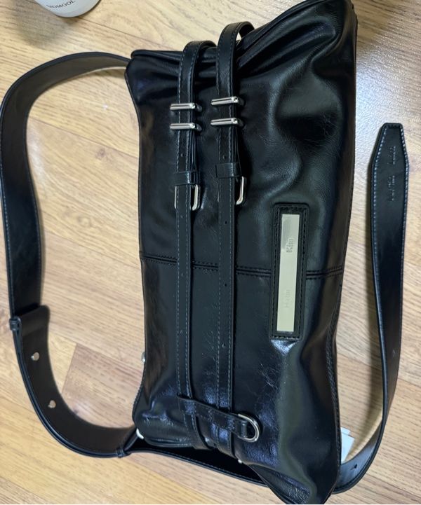 MUSINSA | MATIN KIM DOUBLE BELTED STRAP MINI BAG IN BLACK