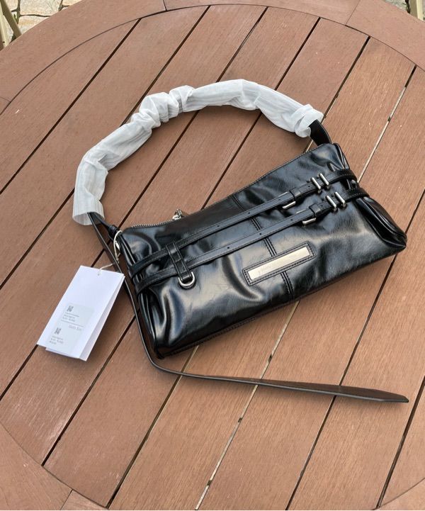 MUSINSA | MATIN KIM DOUBLE BELTED STRAP MINI BAG IN BLACK