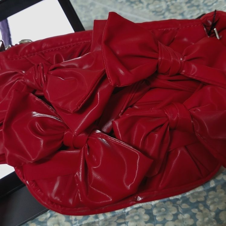 MUSINSA | IUGAMAKARAS Knotted Micro Padding Bag (Glossy-Red)