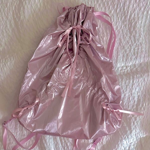 MUSINSA | fennec RIBBON STRING BAG - LIGHT PINK