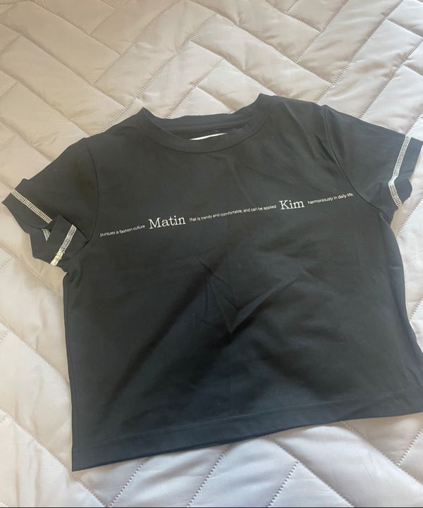 MUSINSA | MATIN KIM MATIN SMALL LINE LOGO STITCH CROP TOP IN BLACK