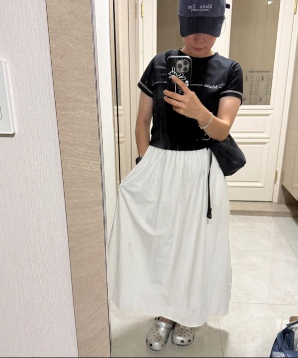 MUSINSA | MATIN KIM MATIN SMALL LINE LOGO STITCH CROP TOP IN BLACK