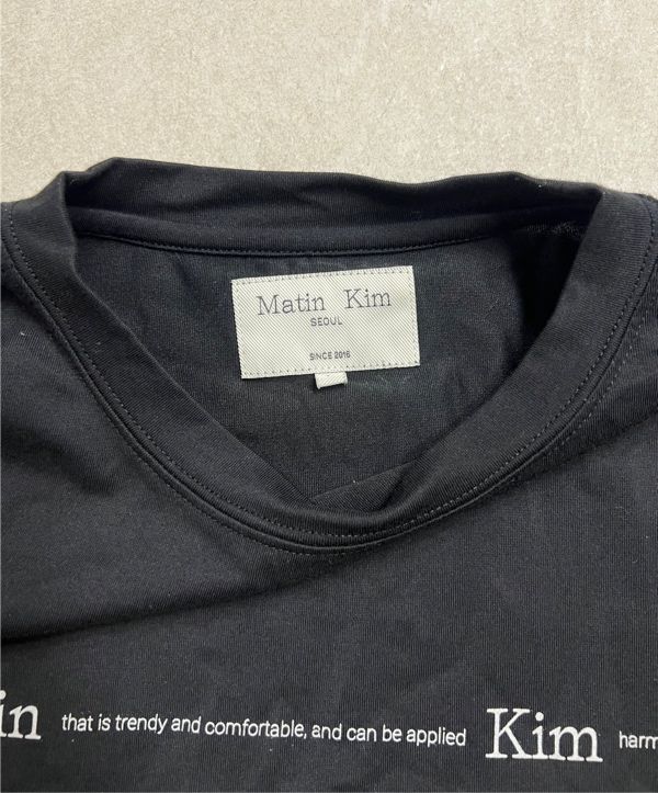 MUSINSA | MATIN KIM MATIN SMALL LINE LOGO STITCH CROP TOP IN BLACK