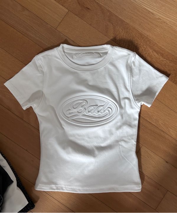 BADBLOOD★韓国人気 Oval Logo T-Shirt - Cream/Black MUSINSA | BADBLOOD Oval Logo T-shirt - Cream