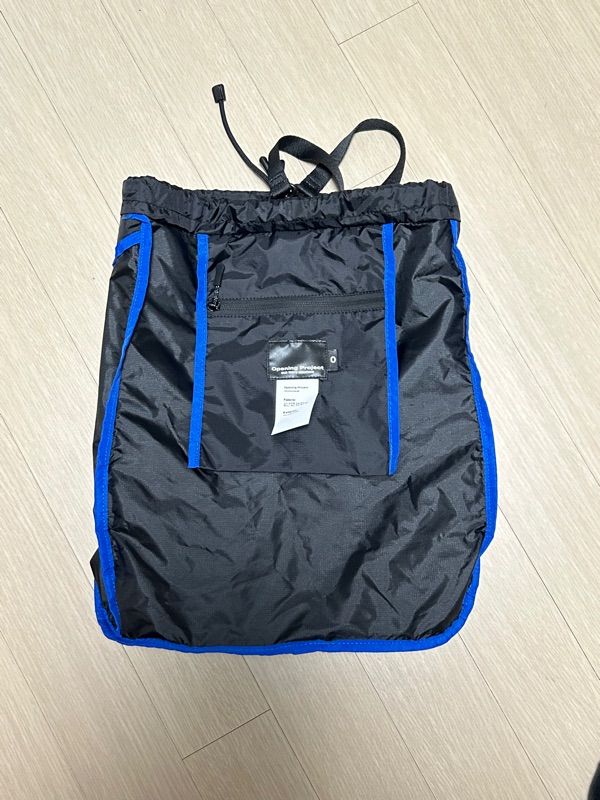 バックパック・リュック OPENING PROJECT Cross Zip Mesh Pocket String Bag 5BJH1328 OPENING PROJECT Cross Zip Mesh Pocket String Bag 5BJH1328