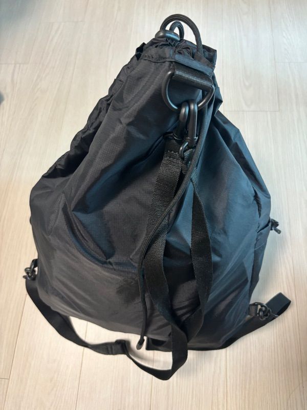 MUSINSA公式 | OPENING PROJECT Mesh Pocket String Bag - Black