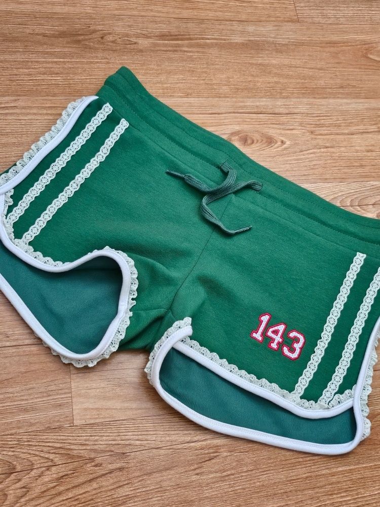 MUSINSA | SCULPTOR Micro Dolphin Shorts Green