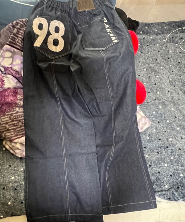 MUSINSA | AAKAM 98 Printed Knee Pin-tuck Denim Pants (Blue)