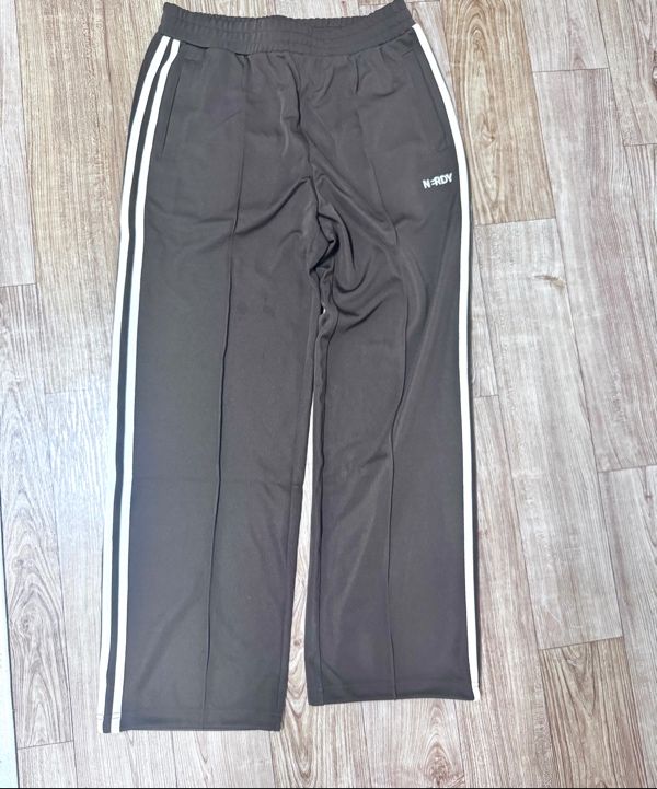 MUSINSA公式 | NERDY Embroidered Logo NY Track Pants Black