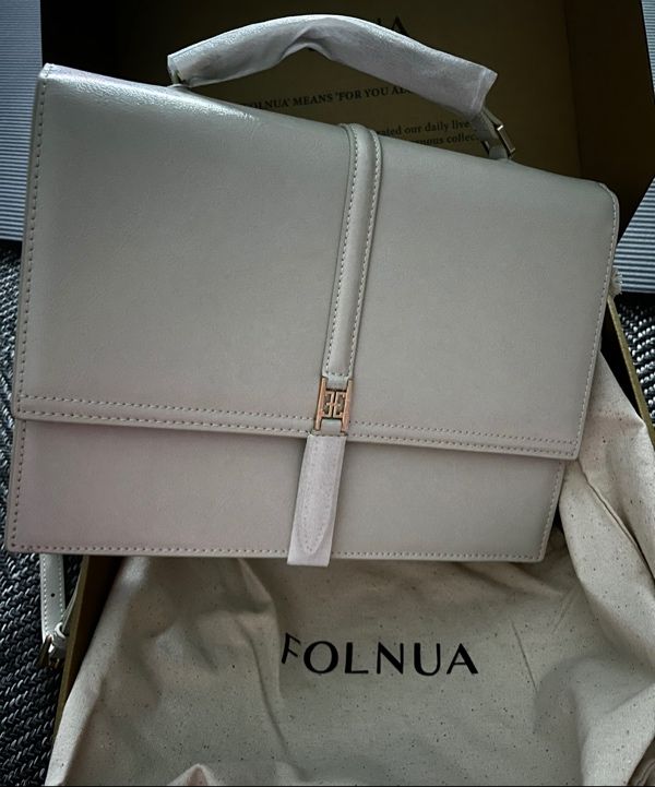 MUSINSA | FOLNUA CLASSIC LOGO HALLIE BACKPACK [ECRU - PLAIN]
