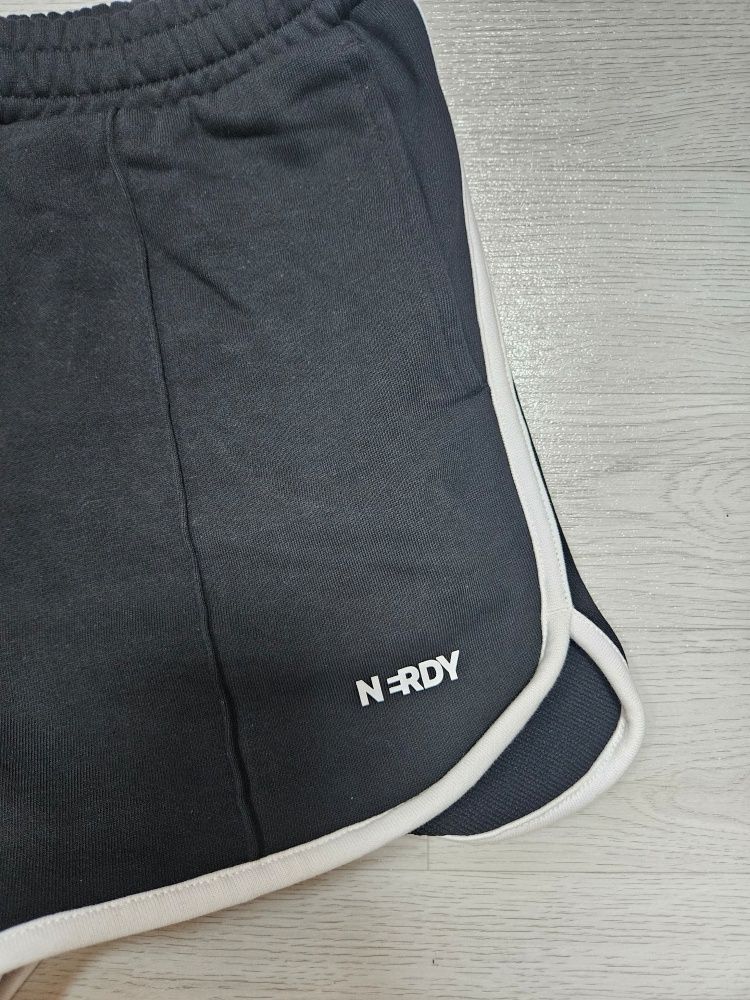 MUSINSA | NERDY Women's Blank Logo Dolphin Shorts Pink