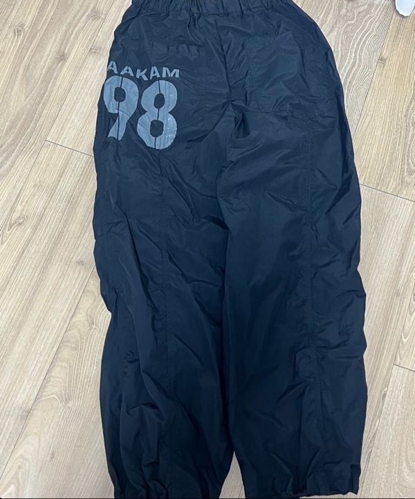 MUSINSA | AAKAM 98 Printed Knee Pin-tuck Nylon Pants (Black)